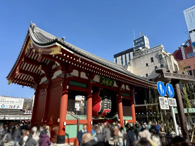 A family walking toward Kaminarimon gate in Asakusa, a flat, stroller-friendly part of Tokyo