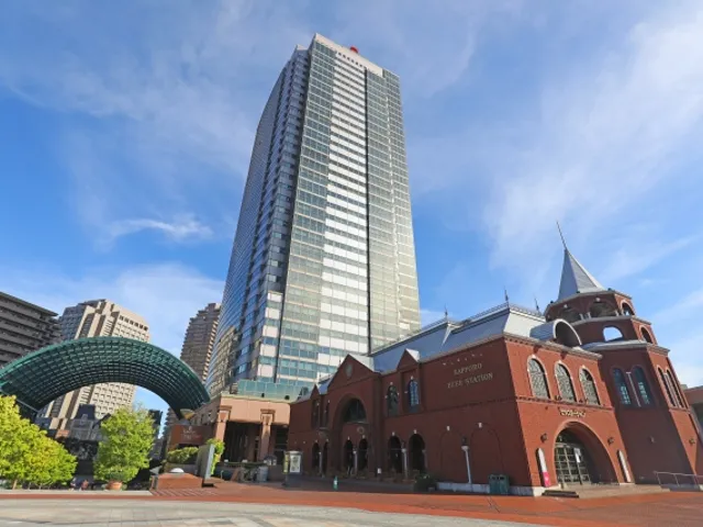 The tower and red-brick beer hall of Yebisu Garden Place, reached from Ebisu Station by a covered walkway
